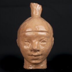 niña rodete, ceramica esmaltada,18x13x16, Josefina Madariaga